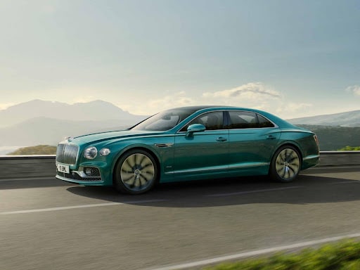 A blue 2024 Bentley Flying Spur