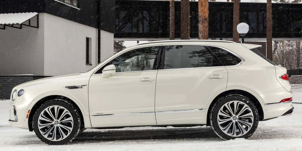 2024 Bentley Bentayga in snow, color white.