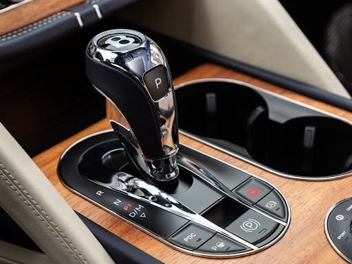 Bentley Bentayga gear shifter with good grain interior.