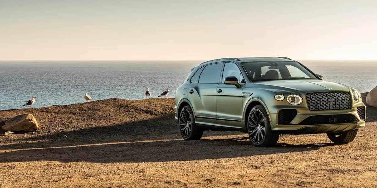 2026 Bentley Bentayga luxury SUV parked near the coastline showcasing exterior redesign and refined styling